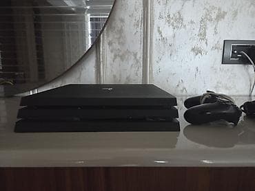 Video oyunlar və konsollar: Salam, PS4 Pro satılır. Yaxşı vəziyyətdədir, çox az istifadə olunub. 1 — 3