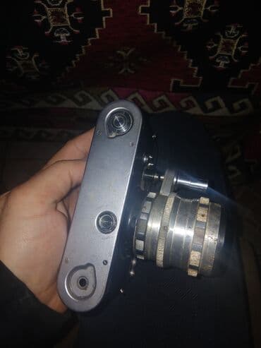 Fotokameralar: Məhsul: Sovet istehsalı 8 mm lentli kino-kamera Təsvir: - Mexaniki — 2