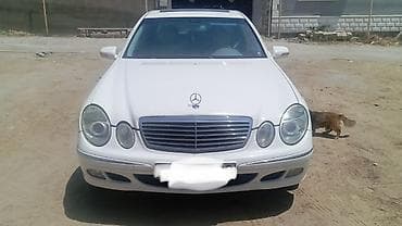 bmw e 38: Mercedes-Benz E 320: 3.2 l | 2004 il Sedan — 1