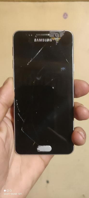 kreditle iphone 11: Məhsul: Samsung smartfon (model ön hissədə “Samsung” loqolu, Home — 2