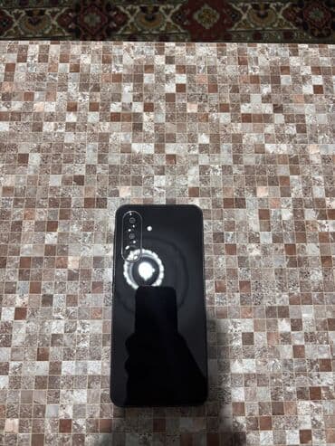 Бытовая техника: Samsung Galaxy A26 5G, 128 ГБ, цвет - Черный, Отпечаток пальца, Две SIM карты, Face ID — 2