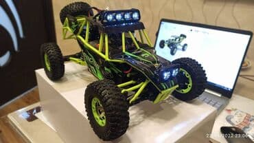 rc car: Wltoys 12428 Rc Car 1/12 Scale. 4WD .2.4Ghz 5Km/h speed.540 Brushed — 7