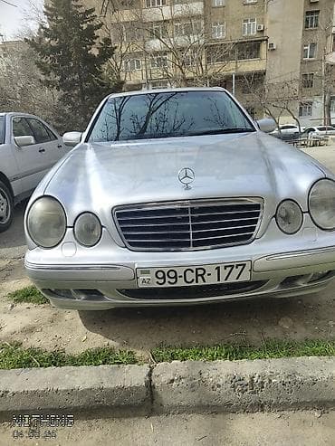 Mercedes-Benz E-Class (W210), gümüş rəng. Xarici: - Klassik W210 — 2
