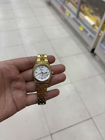 Qızılı rəngdə kişi qol saatı - Korpus: metal, qızılı tonlarda; dişli lalafo.az -da Qızılı rəngdə kişi qol saatı - Korpus: metal, qızılı tonlarda; dişli
