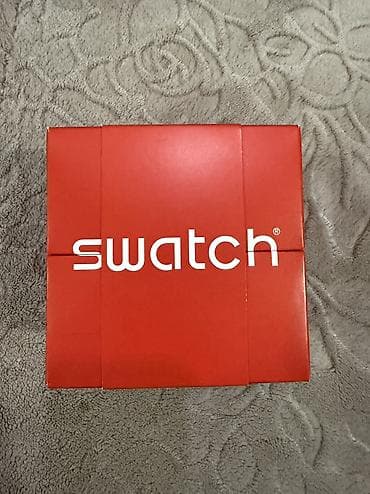 saat ev: Yeni, Qol saatı, Swatch — 1