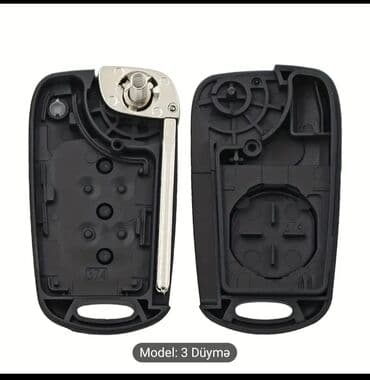 multi kar: Bu, üç düyməli qara rəngli avtomobil açarıdır. Açarda kilidləmə — 3