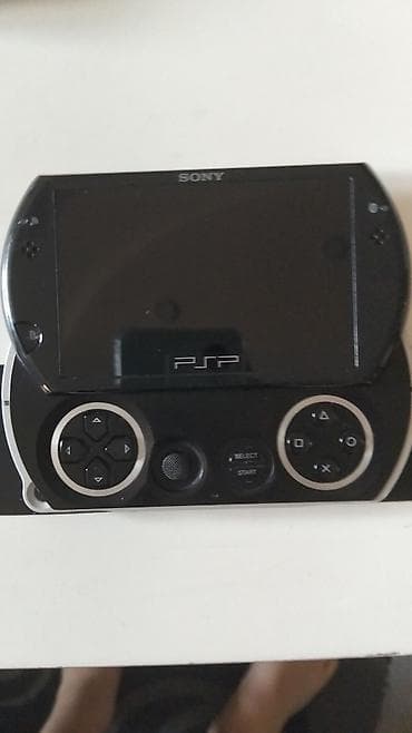 sony wh: Psp Go ideal vəziyyətdə, original reklamı var,11 oyun var: Agent 007 — 4