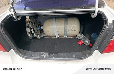 farsonka gaz: Chevrolet Aveo sedan – ağ rəng, 4 qapı, kompakt şəhər avtomobili — 4