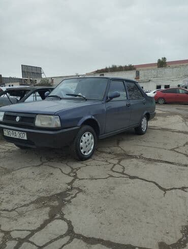 taksi maşınları: Model: Tofas Şahin/Doğan sedan (mavi rəng) Kuzov: 4 qapılı, klassik — 5