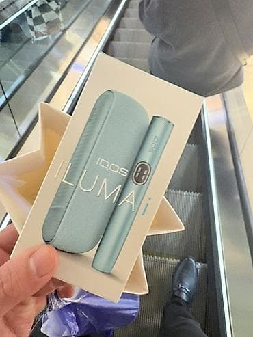 IQOS ILUMA i – tütün çubuqları üçün qızdırıcı cihaz dəsti