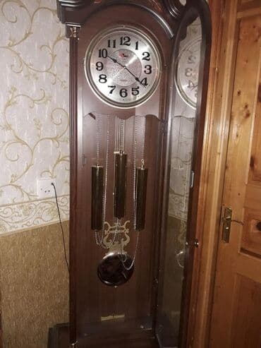 Tünd qəhvəyi rəngli taxta korpuslu, klassik üslublu Saaatın yuxarı lalafo.az -da Tünd qəhvəyi rəngli taxta korpuslu, klassik üslublu Saaatın yuxarı