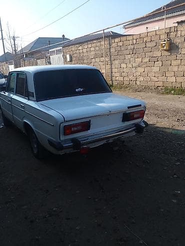 VAZ 2106, ağ rəng, sedan kuzov. Xüsusiyyətlər: - Klassik 2106