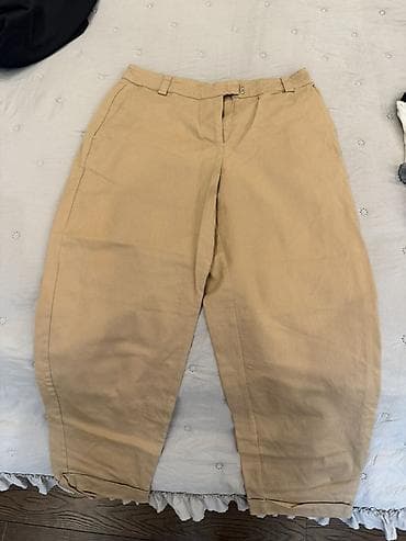 salvar qadin: - Məhsul: Geyim dəsti – 3 ədəd şalvar + 1 ədəd ətək - Tərkib: 1) Bej — 2