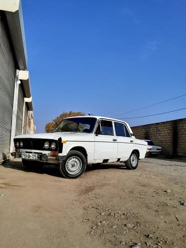opel suret qutusu: VAZ 2106, ağ rəng, sedan kuzov. Klassik dörd fara ön panel, xrom — 2