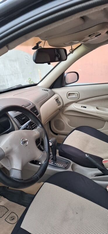 osram lampaları: Nissan Sunny sedan – geniş salonlu, komfortlu şəhər və uzun yol — 8