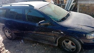 Avtomobil satışı: Opel Astra karvan (universal) – mavi rəng Mühüm xüsusiyyətlər: - — 4