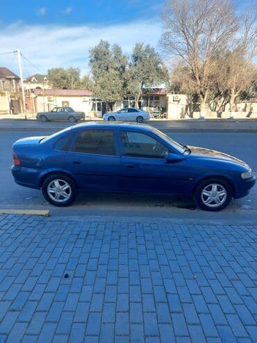 Audi: Opel vectira sedan - Kuzov: 4 qapılı sedan, göy rəng - Salon: parça — 2