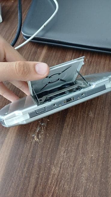 bluetooth qulaqciq samsung: Sony PSP portativ oyun konsolu – gümüş rəng Xüsusiyyətlər: - 4.3 düym — 3
