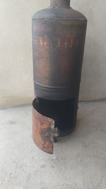 Metaldan hazırlanmış odun/komur sobası - Silindrik gövdə, qalın