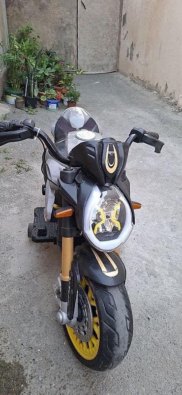 oyuncaq 28may: Uşaq üçün elektrik motosiklet. Boz, qara və sarı rəng — 3