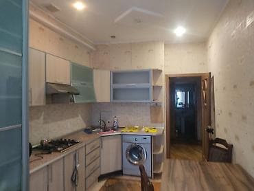 mingecevirde satilan evler: Iki otaq . iki hamam tualeti var . 18 mertebenin 14 mertebesi — 7