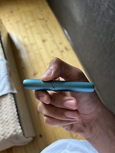 IQOS cihazı – tütün çubuqlarını qızdırma texnologiyası ilə istifadə — 3