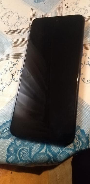 ram 6: Smartfon – tam ekranlı, qara rəng - Ön hissə: iri tam ekran, yuxarı — 1