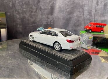 metbex tavan modelleri: Коллекционная модель BMW 750i F02 white 2008 RASTAR Scale 1:43 Art — 4