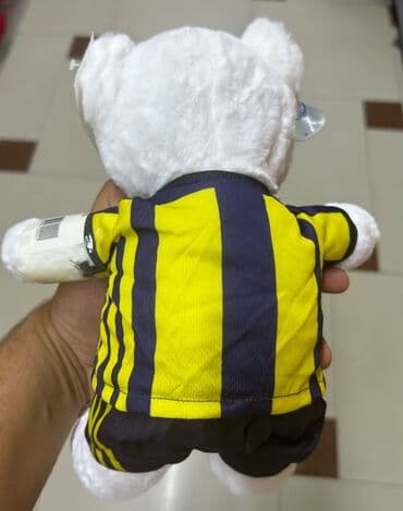 toy donlarl: Loqolu mişkalar satılır. Ağ rəngli, yumşaq oyuncaq ayı, üzərində sarı — 2