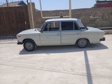 ваза стеклянная прозрачная высокая без узора: ВАЗ (ЛАДА) 2106: 0.3 л | 1992 г. Седан — 2