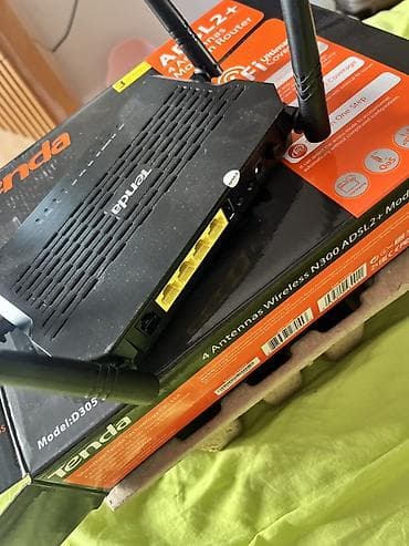 modemler: Tenda D305 ADSL2+ Wi‑Fi marşrutlaşdırıcı Xüsusiyyətlər: - 4 ədəd — 2