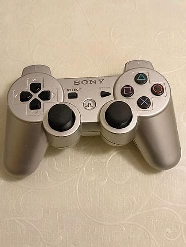piltə: PlayStation 3 Super Slim oyun konsolu + 2 ədəd DualShock 3 pultu — 2