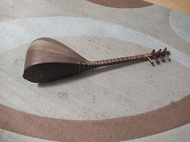 bas gitar: Saz – uzun saplı xalq çalğı aləti - Korpus: armud formalı, çoxzolaqlı — 4