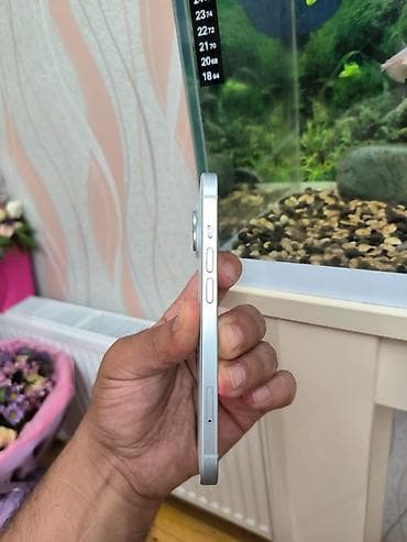 IPhone 15, 256 GB, Pacific Blue, Face ID — 9