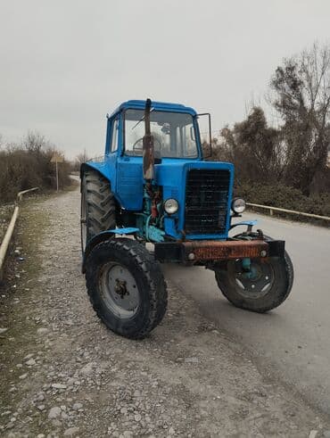 4 təkərli moto: Mavi rəngdə təkər formulalı aqrar traktor. Texniki xüsusiyyətlər: - — 4