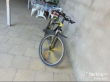 Velosiped – dağ/şosse tipli, qara-sarı dizayn. Texniki xüsusiyyətlər — 3