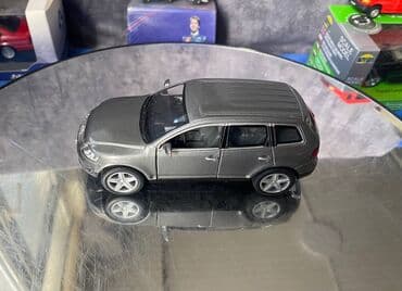 20 qepik: Коллекционная модель volkswagen touareg grey metallic 2003 kinsmart — 13