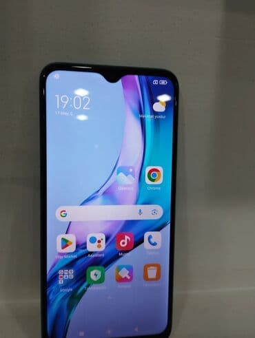 телефон fly cirrus 9: Xiaomi Redmi 9 (Aqua Green) - Ekran: 6.53" Full HD+ IPS, damla — 3