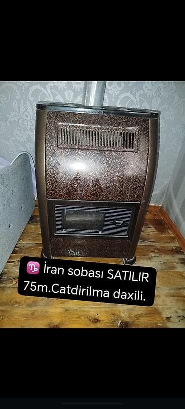sur mikrofon: İran sobası – quraşdırılmış baca çıxışı olan qaz sobası. Ön hissədə — 1