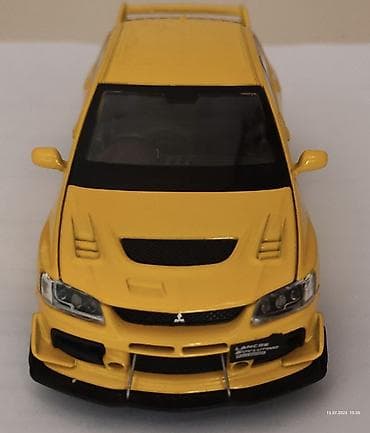 disk dvd: Mitsubishi Lancer Evolution 9 modeli – kolleksiya üçün detalı die-cast — 1