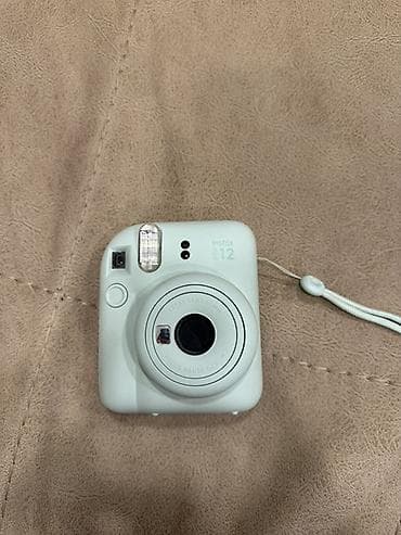 dji osmo mobile: Real alıcıya qiymətdə cüzi endirim olacaq. Fujifilm Instax mini 12 — 1