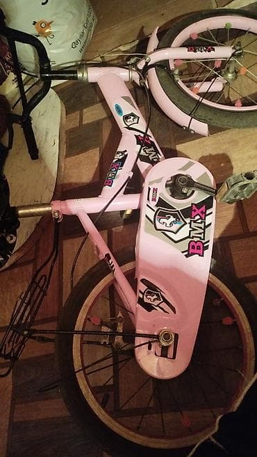 motorlu velosibed: Uşaq velosipedi – BMX üslubunda, çəhrayı rəngdə. Xüsusiyyətlər: - — 5
