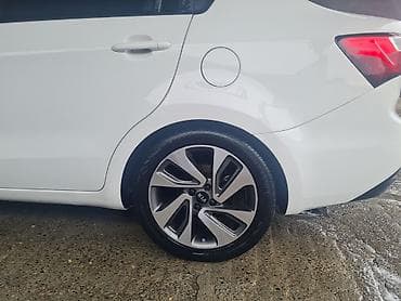 toyota satış mərkəzi: Kia Rio: 1.6 l | 2013 il Sedan — 7