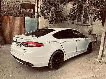 renault clio 2005: Ford sedan salonu və avadanlıqları - Rəng: ağ eksteryer, bej/qara iki — 6