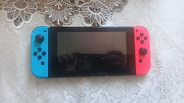 Nintendo Switch (Neon Blue/Neon Red) - Portativ və stasionar oyun