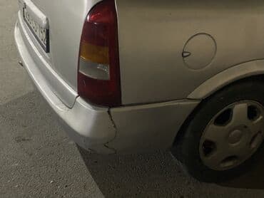 чемодан с инструментами для автомобиля: Opel Astra Caravan (universaI) – gümüşü rəngdə, 5 qapılı ailə və yük — 2