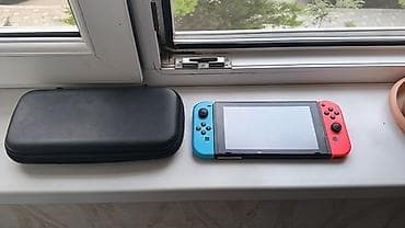 Nintendo Switch (neon mavi/qırmızı Joy‑Con) - Model: Nintendo Switch — 1