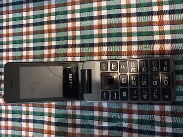 mobil telfonlar: Philips Xenium qapaqlı mobil telefon 10.15 gundu alnib tezdi demek — 4