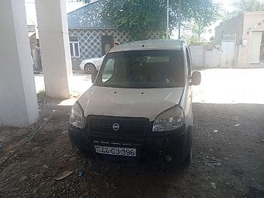 min traktor: Fiat Doblo, ağ rəngli, 5 qapılı miniven/furqon. Xüsusiyyətlər: - — 2