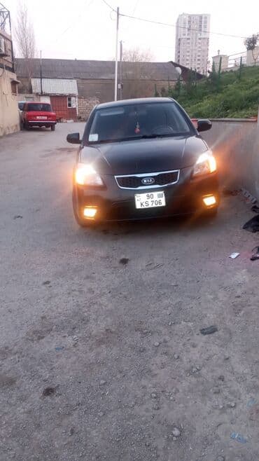 фольксваген тигуан 2 0: Kia Rio: 1.4 л | 2010 г. Седан — 9